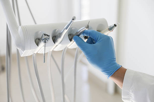 Professional Emergency Dentist technician working in Oxoboxo River, CT